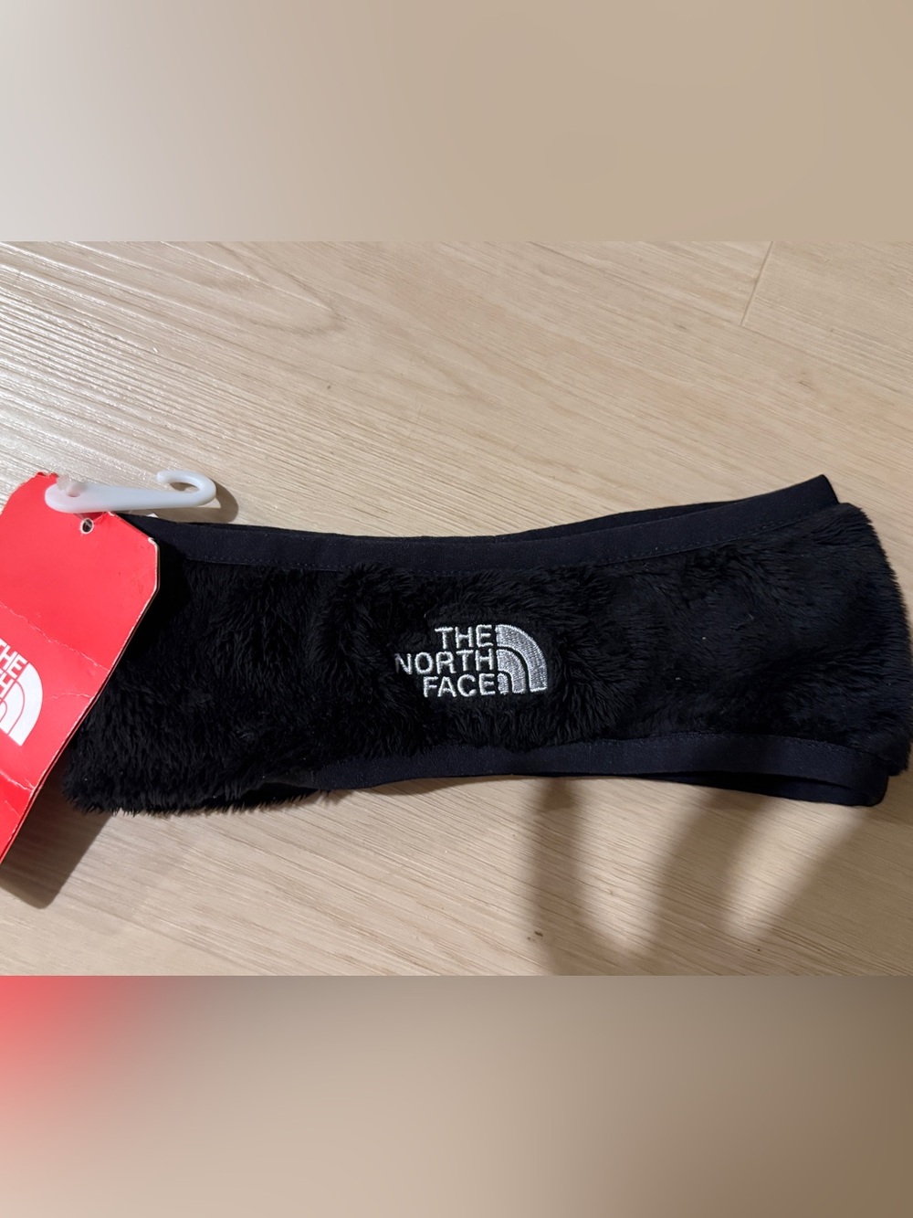 The North Face Black Fleece Ear Warmer Headband—youth